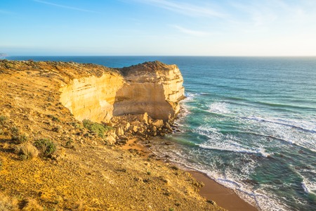 Twelve Apostles at sunset, one of main attractions of Port Campbell National Park world, famous for its collection of wave sculpted rock formations. Great Ocean Road, Victoria State, Australiaの写真素材