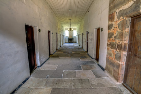 Port Arthur Historic Site, Tasmania, Australia - January 15, 2015: Corridors of the Separate Prison.  each of the four wings comprised a central corridor flanked by rows of solitary confinement cells.のeditorial素材