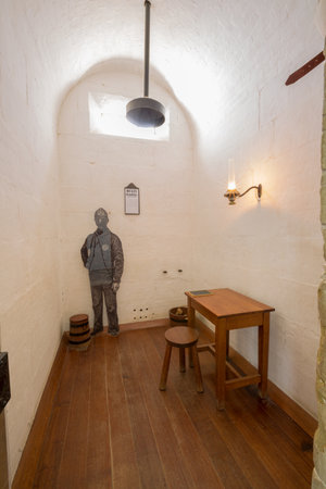 Port Arthur Historic Site,Tasmania,Australia - January 15, 2015: Indoor cell of Separate Prison. each of four wings comprised a central corridor flanked by rows of solitary confinement cellsのeditorial素材