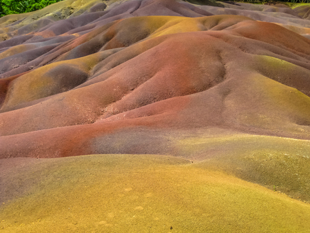 Close up of colored Seven Earths of Chamarel, a geological phenomenon created by volcanic activity and different cooling times. Mauritius, Indian Ocean.の写真素材