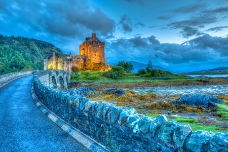 Dornie, Kyle of Lochalsh, Scotland, United Kingdom - May 31, 2015:Eilean Donan Castle at night, Dornie, Kyle of Lochalsh in Scotland, United Kingdom. It is the most visited castle, situated on an island at the confluence of three sea lochs.のeditorial素材