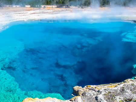 Closeup of Morning Glory Pool, a hot spring in the Upper Geyser Basin in Yellowstone National Park, Wyoming and Montana, United States.の写真素材
