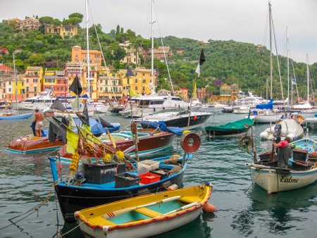 Portofino, Liguria, Italy - circa June 2010: panorama of picturesque harbor and luxurious yachts of Portofino, in the famous vacation resort and italian fishing village, Genoa provinces, Italy.のeditorial素材
