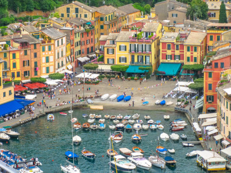 Portofino, Liguria, Italy - circa June 2010: aerial view of Portofino, a famous vacation resort with a picturesque harbor, luxury yachts and celebrity. Italian fishing village.のeditorial素材
