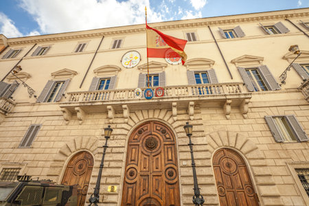 Rome, Italy - May 12, 2016: Spanish Embassy facade with its flying flag in Rome.のeditorial素材