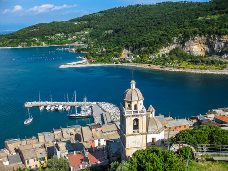 Panoramic view of the romanesque church of St. Lawrence at Portovenere in Cinque Terre, La Spezia, Italy.の写真素材