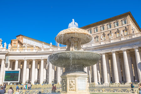 Rome, Lazio, Italy - June 18, 2016: details of San Pietro fountain and Saint Peter Basilica during the Francesco Pope pubblic speaking for jubilee event.のeditorial素材
