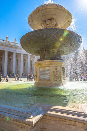 Rome, Lazio, Italy - June 18, 2016: closeup of San Pietro fountain and Saint Peter Basilica of Rome during the Francesco Pope pubblic speaking for jubilee event.のeditorial素材
