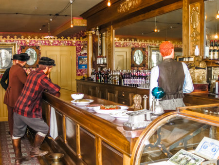 Skagway, Alaska, United States - August 7, 2009: The Mascot Saloon, an authentic restoration of the ancient Skagway. People statues made in wax.のeditorial素材
