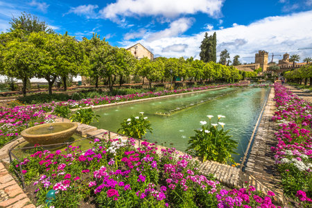 The colorful and blooming gardens in the spring of Alcazar de los Reyes Cristianos in Cordoba, Andalusia, Spain.のeditorial素材
