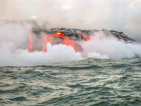 Kilauea Volcano, also Kilauea Smile because from 2016 seems to smile, erupting lava into Pacific...