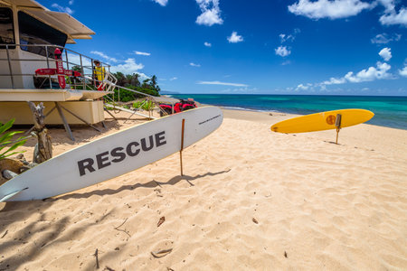 Oahu, Hawaii - August 26, 2016: serf rescue in the popular Sunset Beach, North Shore, in summer. Sunset Beach is also known for its powerful rip current, Sunset Rip, even dangerous for surfers expertsのeditorial素材
