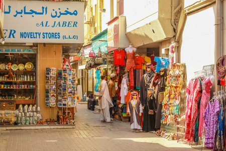 Dubai, United Arab Emirates - May 3, 2013: the traditional Grand Souk in Old Deira, historical Dubai. Arabs and tourists make shopping in traditional Souk.のeditorial素材
