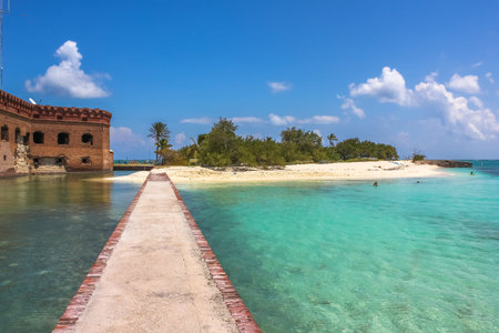 The tropical waters of the Gulf of Mexico surround Historic Fort Jefferson in the Dry Tortugas National Park known for its famous bird, marine life and great place for swimming and snorkeling.のeditorial素材