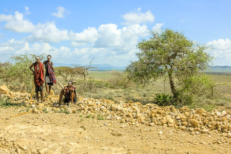 Serengeti, Tanzania - January 6, 2013: young Maasai warriors shortly after circumcision ceremony, a...