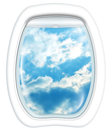 cloudy sky from a plane through the porthole window. Copy space.の写真素材