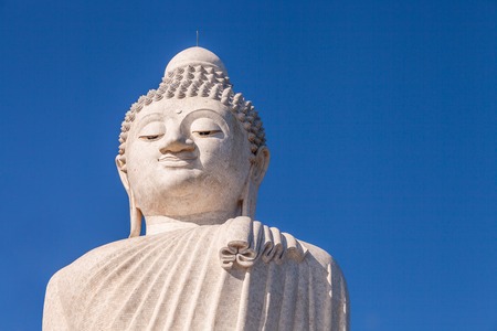 Close up of the Big Buddha head. Front view. Nakkerd hills in Ao Chalong, Phuket, Thailand. Visible almost everywhere, the Big Buddha has become one of the most popular attractions in Phuketの写真素材