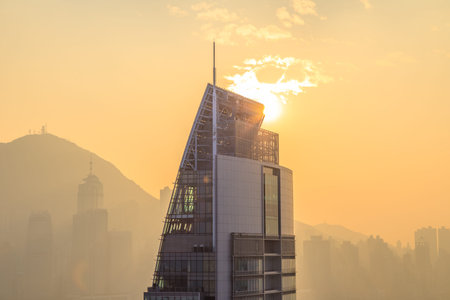 Hong Kong, China - January 1, 2016: aerial view of close up of UBS Kowloon Office at sunset from the...