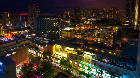 Colorful night life lights of Waikiki city from top overlook. Oahu island Hawaii, United States. City night lights and nightlife concept.の写真素材