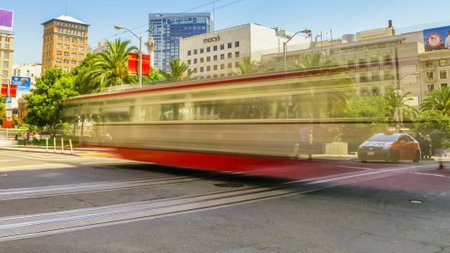 San Francisco, California, United States - August 17, 2016: cable car motion blur crossing Union...