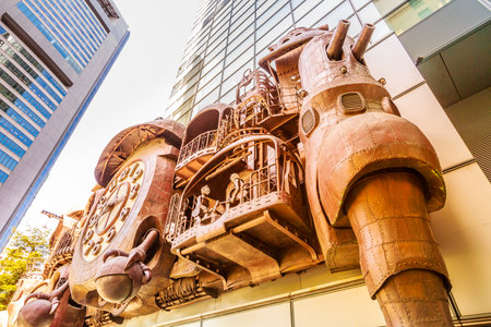Tokyo, Japan - April 20, 2017: prospective view of victorian steampunk Giant Ghibli clock. The clock is located in front of Nittele Tower (Nippon Television headquarters) in Shiodome area, Minato wardのeditorial素材
