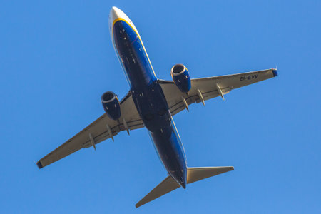 Bologna, Italy - December 20, 2016: a blue Ryanair passenger commercial jet plane isolated against the blue sky. Ryanair is main european low cost flights companyのeditorial素材