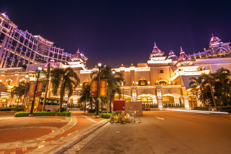 Macau, China - December 8, 2016:illuminated front parking at night of Shining Galaxy casino hotel in Cotai Strip of Macau for laser show. Macau is Asian gambling capital, visited by millions of peopleのeditorial素材