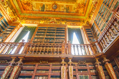 Coimbra, Portugal - August 14, 2017: University baroque library in Coimbra, the Europes oldest university founded in 1290. Unesco Heritage and most important tourist attraction in Coimbra.Bottom viewのeditorial素材
