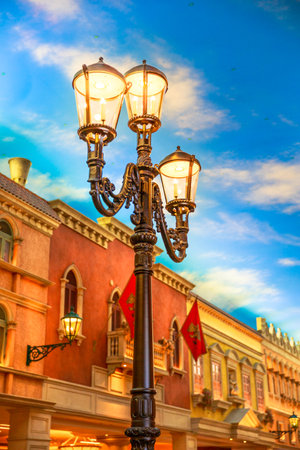 Macau, China - December 9, 2016: closeup of a lamp inside the famous luxurious shopping mall in Venice style in The Venetian Hotel e Casino. Macau, Cotai Strip. Architecture background. Vertical shot.のeditorial素材