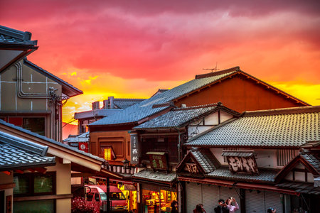 Kyoto, Japan - April 24, 2017: shops of famous Sannen-zaka, a pedestrian shopping street on the way to Kiyomizu-dera Temple  at twilight. Southern Higashiyama area.のeditorial素材