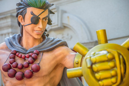 Hong Kong, China - December 5, 2016: close up of Doggie, statue of famous characters, in Hong Kong Avenue of Comic Stars, Kowloon Park. Defocused background of Tsim Sha Tsui District.のeditorial素材