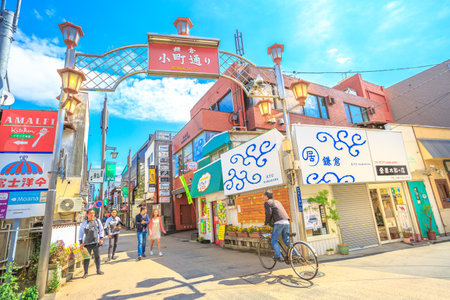 Kamakura, Japan - April 23, 2017: Komachi-dori Street, the shopping street outside Kamakura station. The popular touristic street is in ancient city of Kamakura with historic restaurants and stores.のeditorial素材