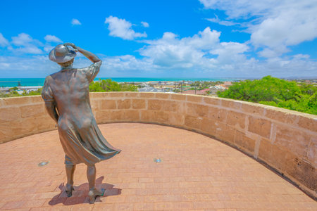 Geraldton, Australia - Dec 18, 2017: the Waiting Woman statue at HMAS Sydney II Memorial in Geraldton, atop Mount Scott overlooking the port of the city in Western Australia. Sunny day with blue sky.のeditorial素材