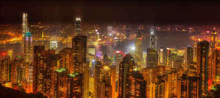 Panorama of Hong Kong, China. Spectacular night view of Victoria Harbour skyline from Victoria Peak....