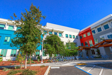 Mountain View, CA, United States - August 15, 2016: the blue branded bikes used by Facebook employees to move around FB headquarters building near the Google HQ. Facebook is located in Silicon Valley.のeditorial素材