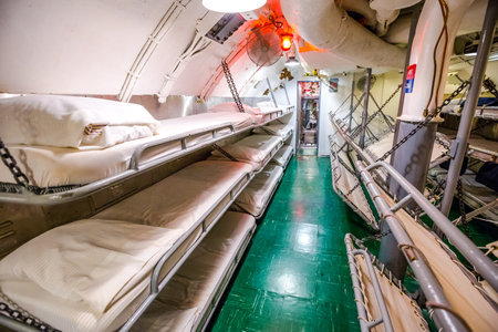 HONOLULU, OAHU, HAWAII, USA - AUGUST 21, 2016: sleeping room with camp beds of USS Bowfin Submarine SS-287 at Pearl Harbor. Popular tourist attraction in Oahu, Hawaii.のeditorial素材