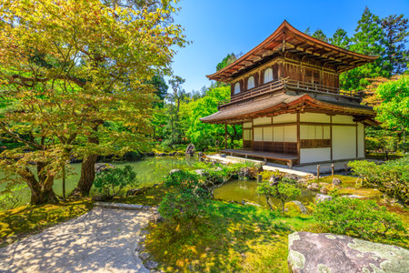 Kannon-Hall and pond in Ginkaku-ji Temple, spring season with blue sky. Ginkakuji or Silver Pavilion, officially named Jisho-ji, is a Zen temple in Higashiyama District, Kyoto, Japan.のeditorial素材