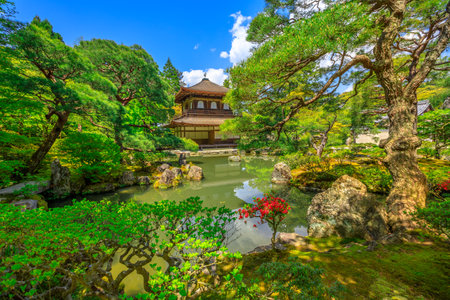 Scenic landscape of pond in springtime and architecture of Kannon-Hall in Ginkakuji Temple. Ginkaku-ji or Silver Pavilion, officially Jisho-ji, is a Zen temple in Higashiyama District, Kyoto, Japan.のeditorial素材
