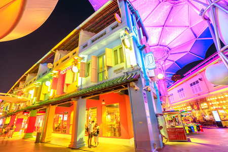 Singapore - May 5, 2018: street view and colorful futuristic umbrellas ceiling of Clarke Quay, an...