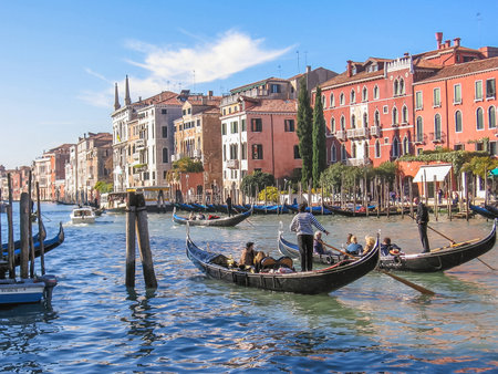 Venice, Italy - September 14, 2007: Traditional gondola boats with tourists in tour on Canal Grande, the main and biggest canal of Veniceのeditorial素材