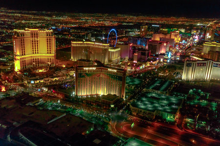 Las Vegas, Nevada, United States - August 18, 2018: aerial view from scenic flight of Las Vegas Strip by night. The Mirage, The Venetian, The Palazzo, Treasure Island, High Roller Ferris Wheelのeditorial素材