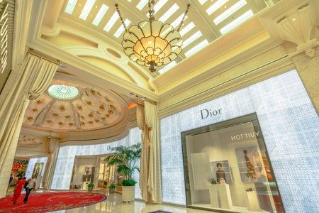 Las Vegas, Nevada, United States - August 18, 2018: couple walk inside Encore Esplanade that connects Encore Las Vegas with Wynn Las Vegas Hotel Resort Casino, a luxury shopping of famous brands.のeditorial素材