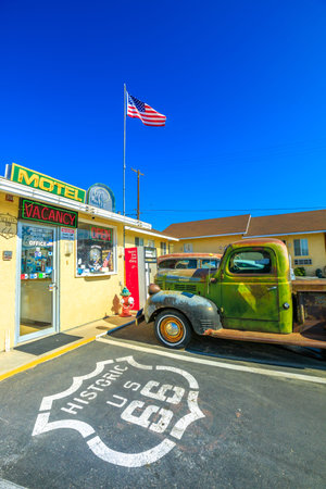 Barstow, California, USA - August 15, 2018: vintage Dodge Truck at historic Route 66 Motel in Barstow on Route 66, the citys Main Street in San Bernardino County. Vertical shot.のeditorial素材
