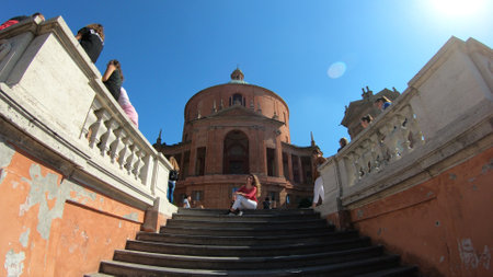 Bologna, Italy - September 29, 2018: tourists taking pictures on the stairway of Holy Mary of San Luca church in Bologna on holiday.のeditorial素材
