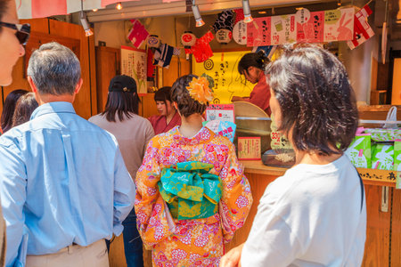 Tokyo, Japan - April 19, 2017: popular stand selling the Kibidango to Japanese dumpling made from the meal or flour of the kibi grain. Nakamise-dori street in Senso-ji Buddhist Temple, Asakusa.のeditorial素材