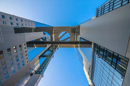 Osaka, Japan - April 28, 2017: bottom view of Floating Garden Observatory in Umeda Sky Building, Kita-ku district.The structure consists of two twin towers connected to each other in the higher floorsのeditorial素材