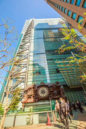 Tokyo, Japan - April 20, 2017: vertical bottom view of Ghibli clock of Nittele Tower, Nippon Television headquarters, Minato ward. The victorian steampunk clock icon of Shimbashi District.のeditorial素材