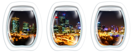 Three plane portholes on Kings Park near of Perth Skyline with skyscrapers and light trails of traffic and Swan River. Perth, Western Australia, from a plane on the portholes windows. Copy space.の写真素材