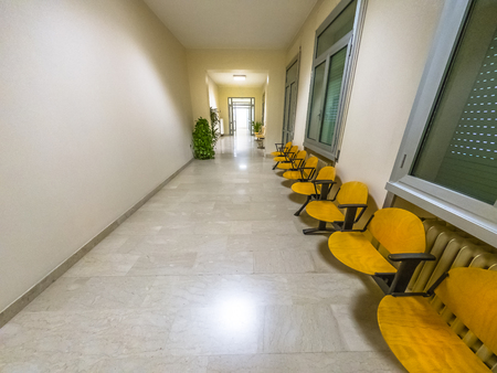 generic medical waiting room of a hospital lane interior. Blurred medical and healthcare background.の写真素材