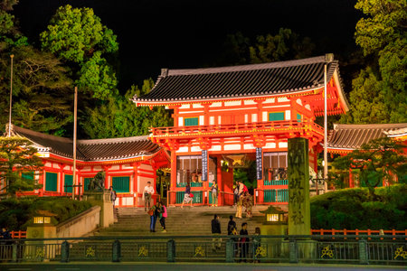 Kyoto, Japan - April 24, 2017: people at main gate or Ro-mon of Yasaka Shrine, illuminated at night in Higashi Oji Dori. The Gion Shrine is one of most famous shrines in Kyoto. Gion District.のeditorial素材